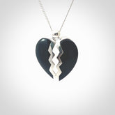 This is a handcarved love heart pendant made from a gorgeous and striking piece of Black Jade with sterling silver. This is a superbly carved and very unique piece if custom jewellery. For sale online from NZ Pacific.